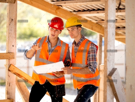 demo-attachment-136-op_two-men-dressed-in-shirts-orange-work-vests-and-KE9JMU2-scaled